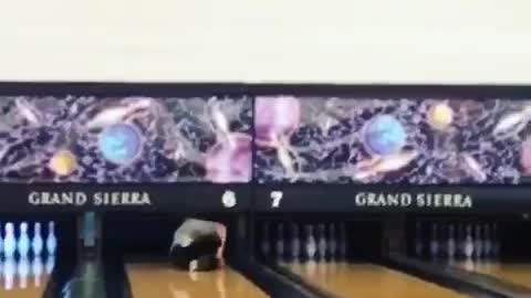 Guy runs down bowling lane for one pin fail