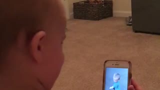 Baby laughing at video of himself
