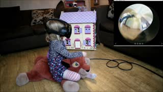 VR allows little girl to ride through house on cat
