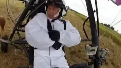 Putin in the Wild: Vladimir Putin Flying with Siberian Cranes in a Hang-Glider