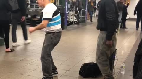 White polo strips dancing subway guy rapping singing