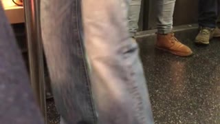 Person with blue underwear over jeans dancing