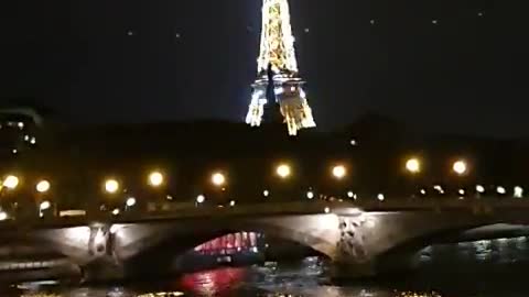 At night, the Eiffel Tower in Paris