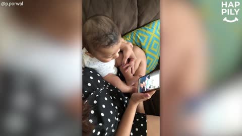 Baby Entertained By Laughing At Himself Laughing On Video