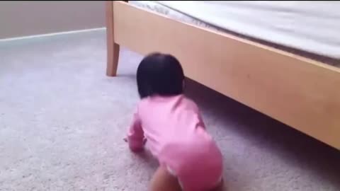 Baby crawls under bed_batch