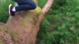 Girl grey sweater rope swing slip fail dirt