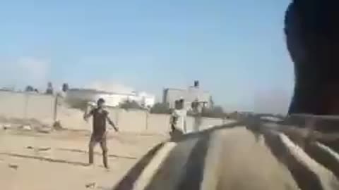 Palestinians driving IDF vehicles into the Gaza Strip. Israeli soldiers being taken hostage.