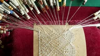 Craftswoman Shows The Intricate Process Of Lace Making