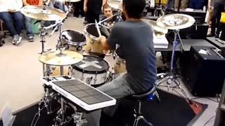 AMAZING DRUMMER PLAYING THE SIMPSONS THEME