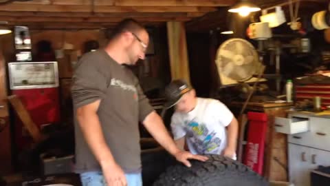 The Dans FJ40 #72 - mounting the 35" Dick Cepeks on the tire machine.