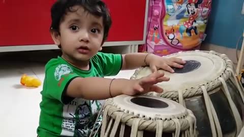 Tabla: 16 months baby playing tabla