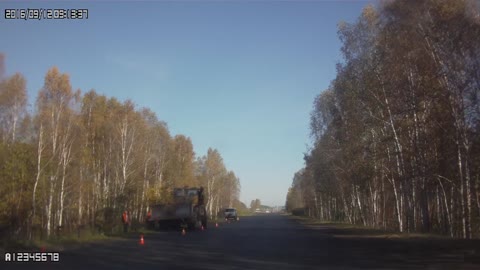 Near Miss with a Logging Truck