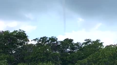 Waterspout Shoots Into the Sky