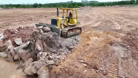 001. Clearing Lake and landfill using Dozer D68P and Dump truck 25T