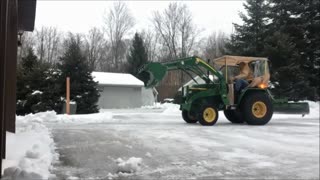 John Deere 770 Plowing Snow