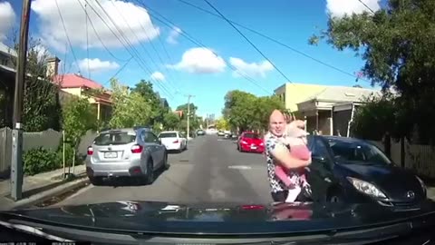 Little girl runs into street without looking😲