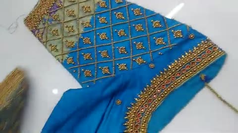 Blue colour saree blouse designing aari work