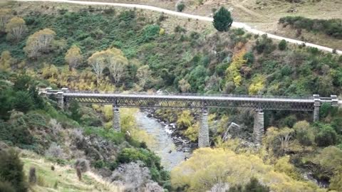 The one-lane bridge shared by cars and trains