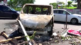 Guadeloupe Covid riots leave burnt cars and buildings