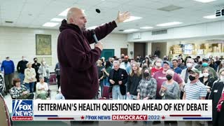 Democratic candidate Fetterman using computer to understand questions