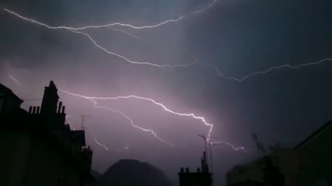 Purple Lightning Strike Lights Up The Sky During A Storm