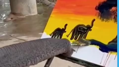 This elephant can definitely paint better than I do