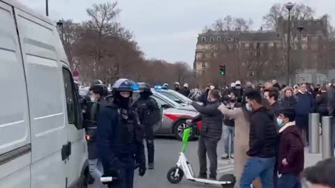 France, Police State Deploying three police officers for every one protester.