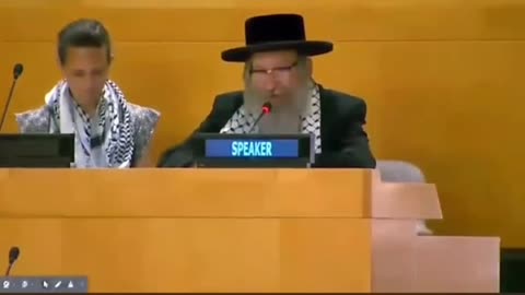 Rabbi speaking at a panel discussion at the United Nations headquarters in New York