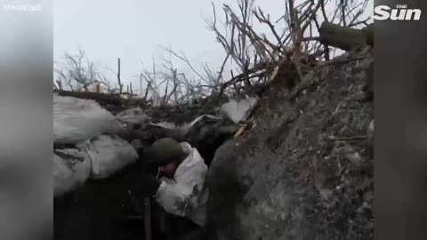 One Ukrainian soldier valiantly repels a Russian assault on a trench.