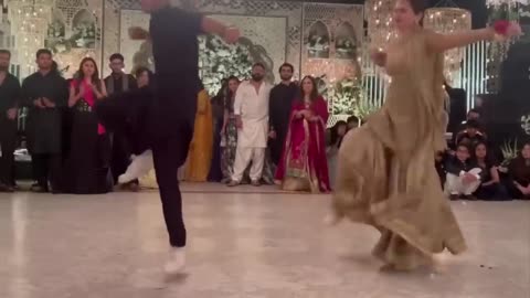 Hania dance with her brother