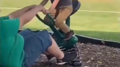 Man Finds Out The Hard Way He's Gotten Too Big For The Play Ground Equipment