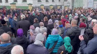 Ukrianian Orthodox Christains gather for the fourth straight day to pray at the Lavra Caves