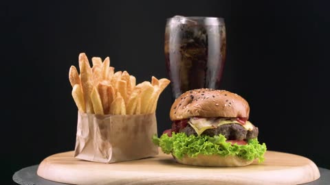 Hamburger with French fries and soda