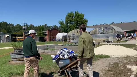 Farmer Daniel Hauling the Wheelbarrow