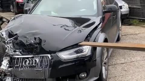 The hood of the car is stuck and can't be opened. Try using a forklift.