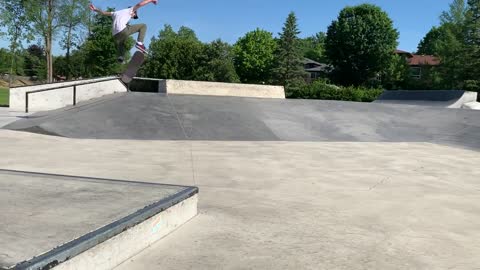 Skater Lands A Smooth Kickflip Over Hip