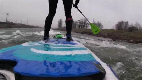 Guy Falls off Board in Water While Stand up Paddling