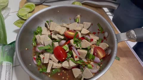 Spicy pork salad with fermented fish sauce
