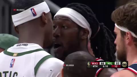 Giannis gets absolutely hacked by Montrezl Harrell and Bobby Portis immediately gets in Trez's face