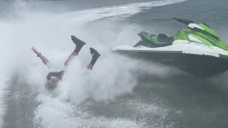 Jet Ski Trick Ends with Guy in the Water