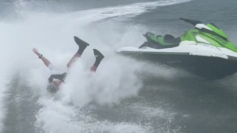 Jet Ski Trick Ends with Guy in the Water