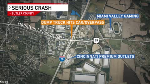 Cars struck by concrete after dump truck crashes on overpass, driver critically injured