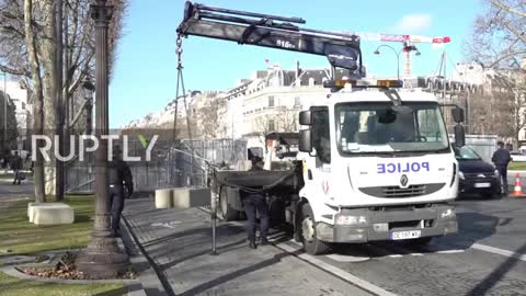France: Police build barricades in central Paris to stop truck convoy