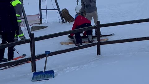Snowboarders Fail to Ride Rope Tow Ski Lift