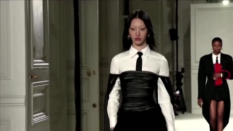 Valentino showcases monochrome on Paris catwalk