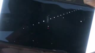 string of 17 lights move across sky in seconds