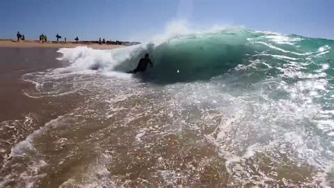 Surfing and Skimboarding WEDGE on massive HIGH TIDE