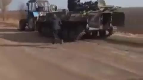 Theft Tank of Russia by Ukrain farmer by Tractor