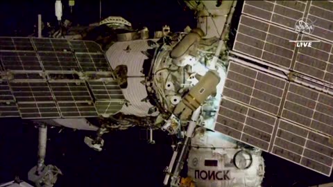 Cosmonauts take a spacewalk to relocate hardware
