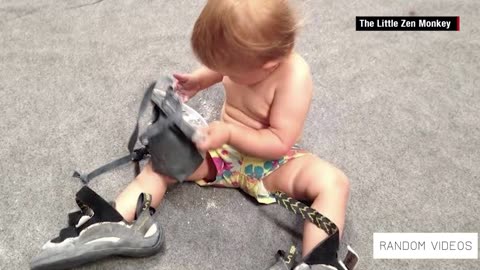 AMAZING BABY CLIMBS ROCK WALL